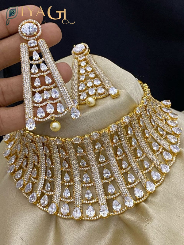 Gold tone white green stone choker necklace earring set for bridal and festive occasions - PiyaGuJwells