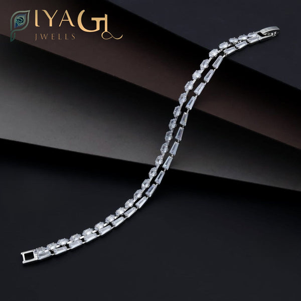 Gold-tone tennis bracelet with white American Diamonds for party wear - PiyaGuJwells