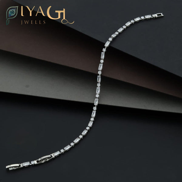 Gold-tone tennis bracelet with white American Diamonds for party and festive wear - PiyaGuJwells