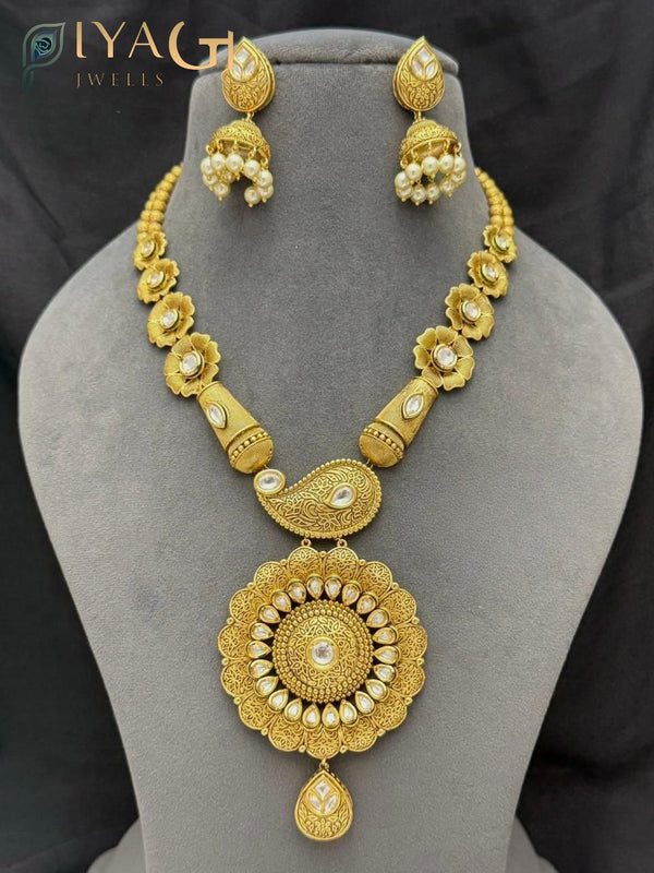 Gold-tone floral white stone layered necklace set for ethnic occasions - PiyaGuJwells