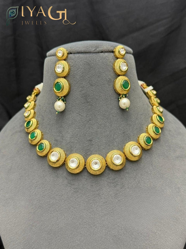 Gold tone white Stone layered necklace with circular design for festive occasions - PiyaGuJwells