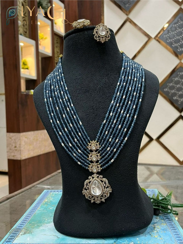 Silver tone oxidised floral design blue stone layered necklace set for ethnic wear - PiyaGuJwells