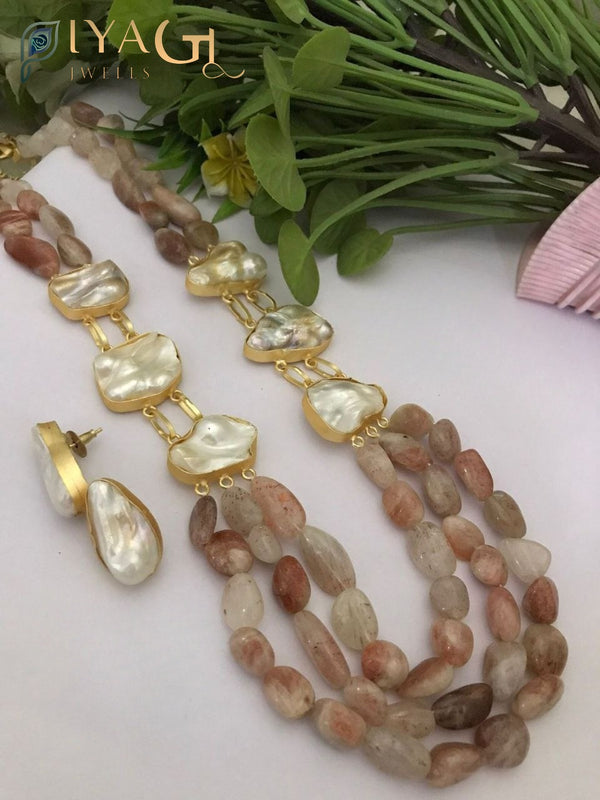 Gold tone white pearl layered necklace and earring set for festive wear - PiyaGuJwells