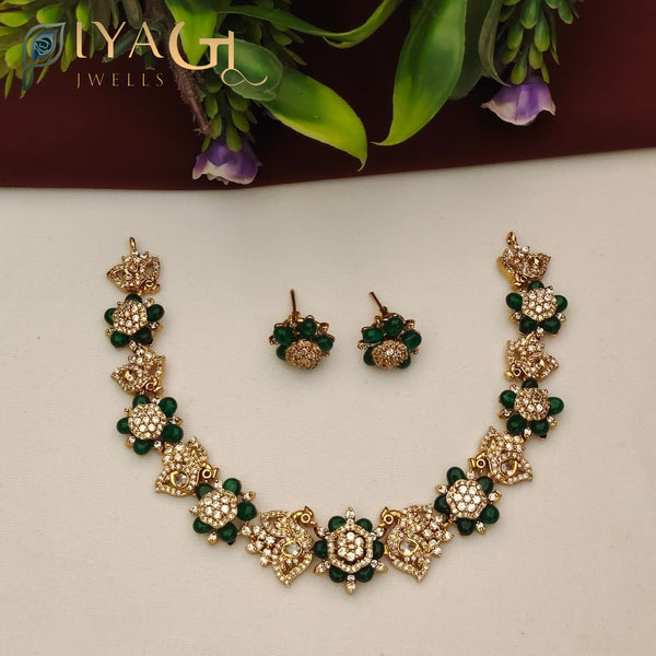Gold-tone tone green stone floral choker necklace set for festive occasions - PiyaGuJwells