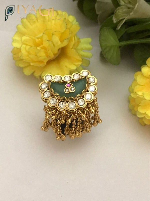 White and red polki stones on a gold-tone floral ring for festive occasions - PiyaGuJwells