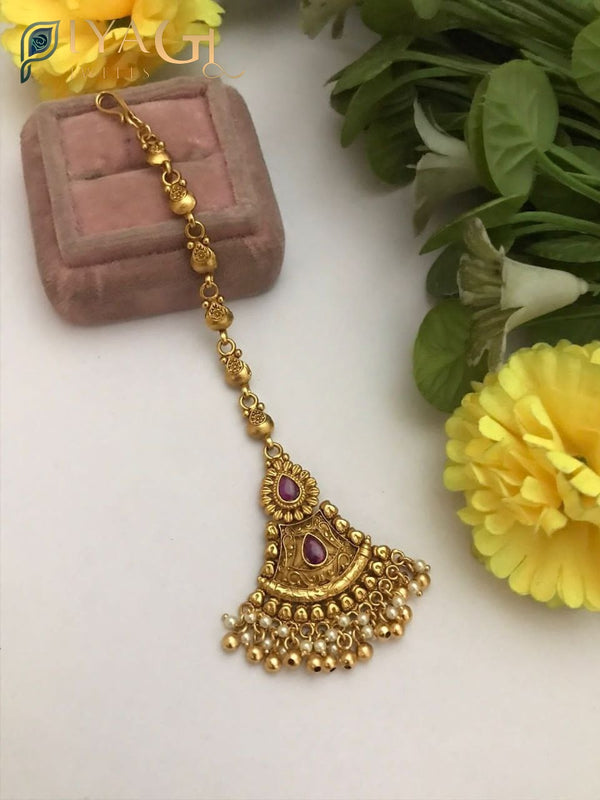 Gold platted floral design purple polki maang tikka for ethnic occasions - PiyaGuJwells