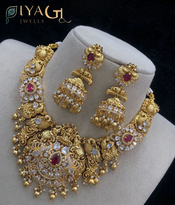 Gold tone polished floral design layered necklace set for bridal wear - PiyaGuJwells
