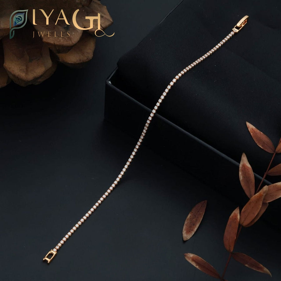 Gold-tone tennis bracelet with white American Diamonds for party and festive occasions - PiyaGuJwells