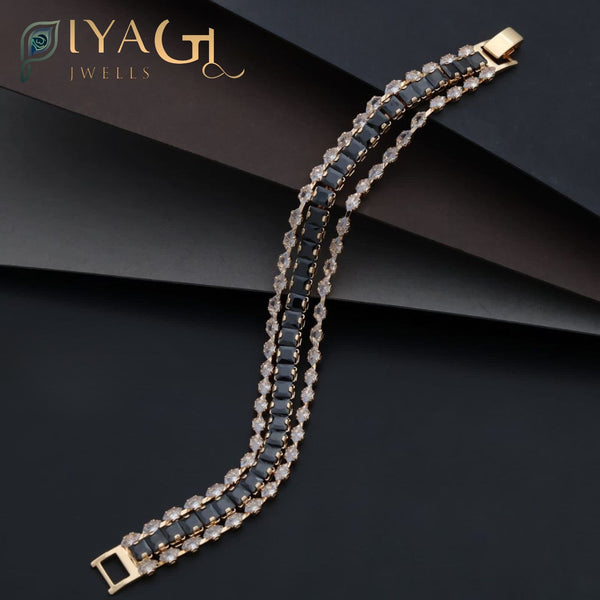 Gold-tone tennis bracelet with white American Diamond stones for party wear - PiyaGuJwells
