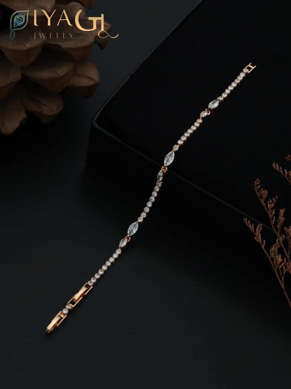 Gold-tone chain bracelet with white American Diamonds for party wear - PiyaGuJwells