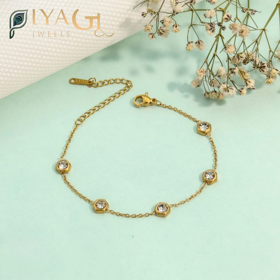 Gold-tone chain bracelet with white American diamonds for party wear - PiyaGuJwells