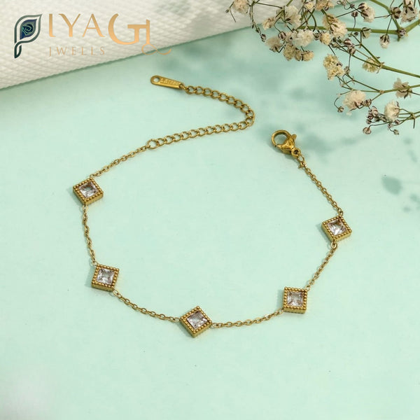 White American diamond gold-tone chain bracelet for party wear - PiyaGuJwells