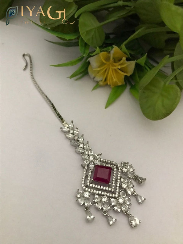 Silver finished geometric design red cubic zirconia maang tikka for festive occasions - PiyaGuJwells