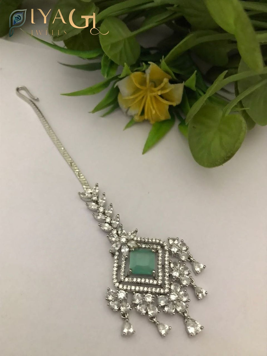 Silver finished geometric design red cubic zirconia maang tikka for festive occasions - PiyaGuJwells