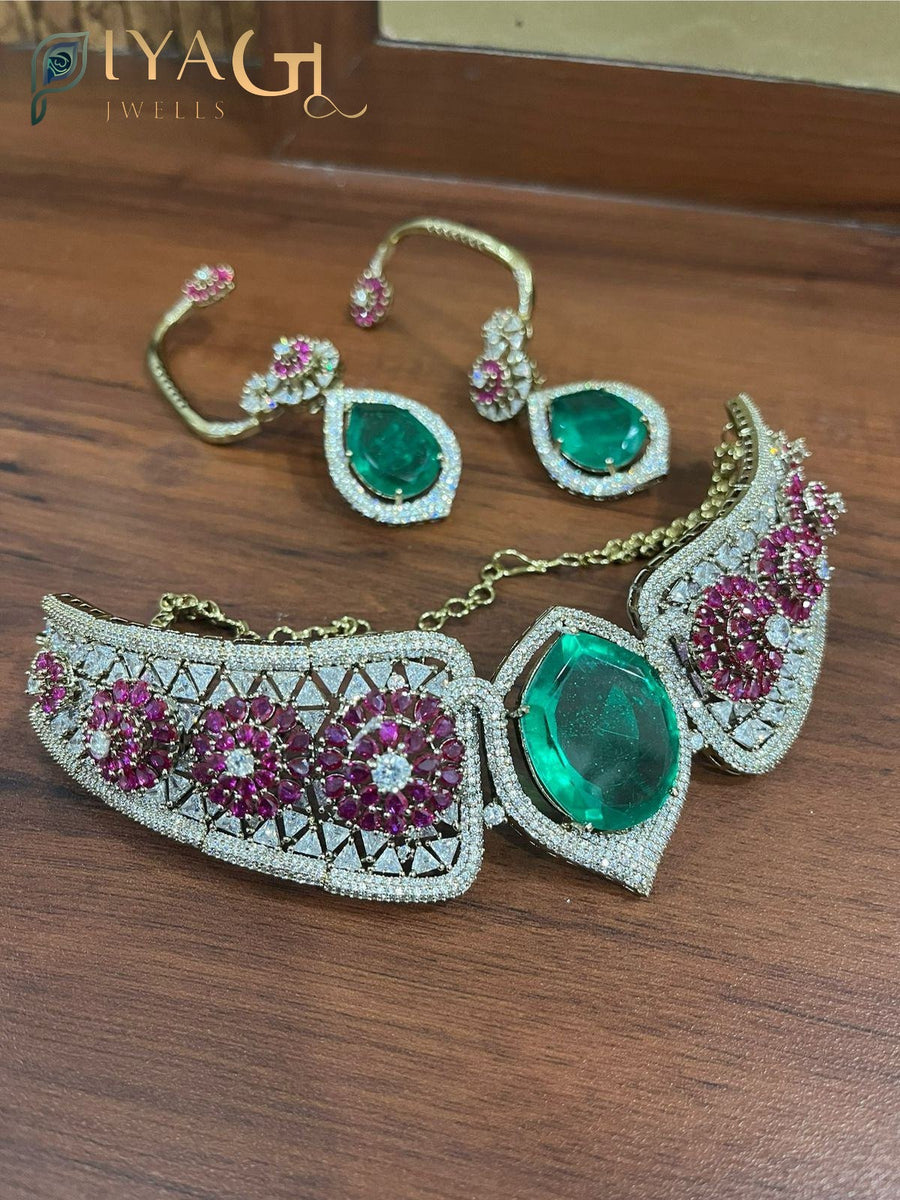 Gold finished floral design green stone artificial jewellery choker set for bridal wear - PiyaGuJwells