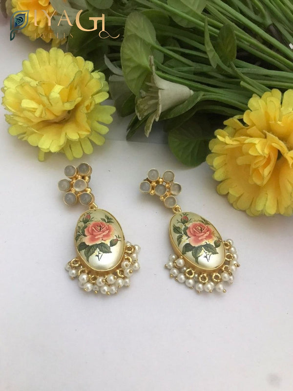 Handmade fusion earrings with green bead accents for festive wear - PiyaGuJwells