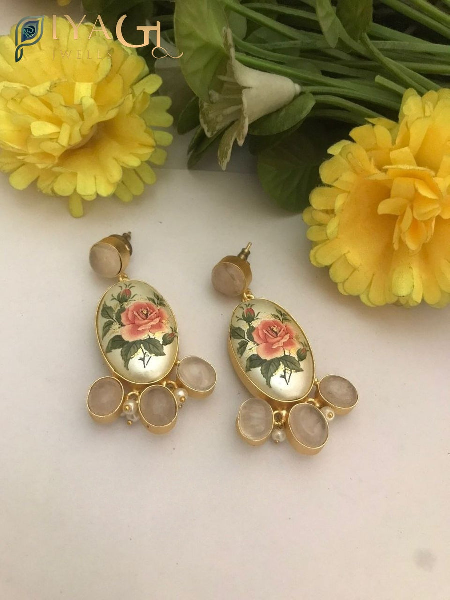 Handmade fusion earrings with green bead accents for festive wear - PiyaGuJwells