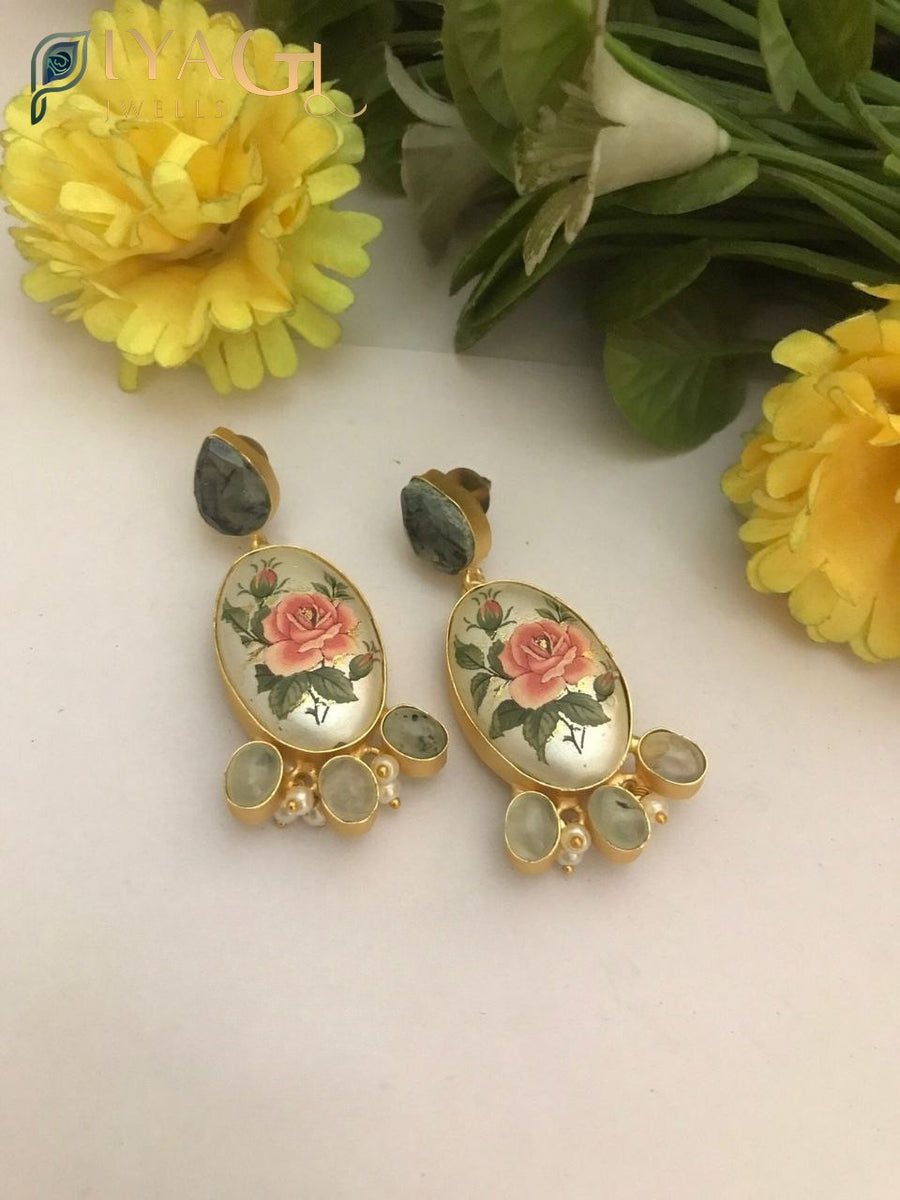 Handmade fusion earrings with green bead accents for festive wear - PiyaGuJwells