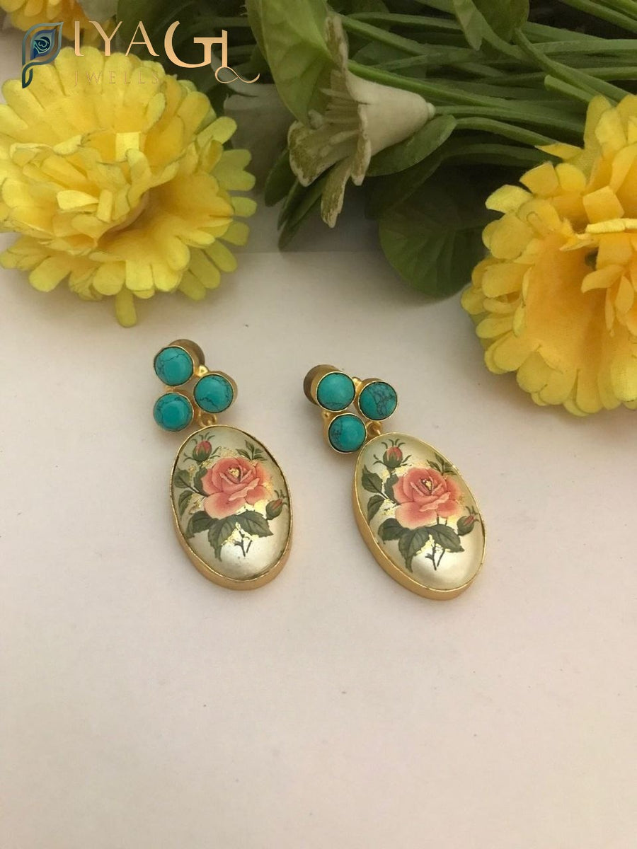 Handmade fusion earrings with green bead accents for festive wear - PiyaGuJwells