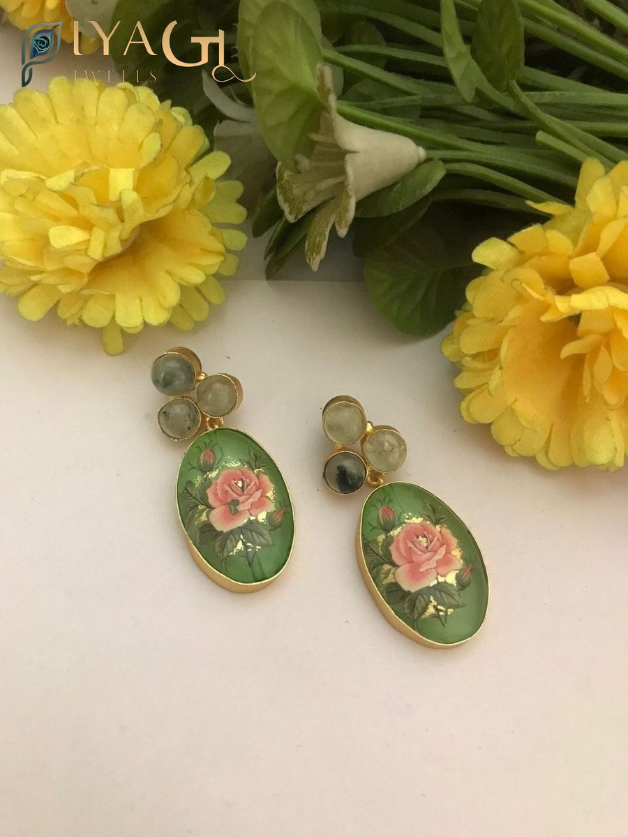 Handmade fusion earrings with green bead accents for festive wear - PiyaGuJwells