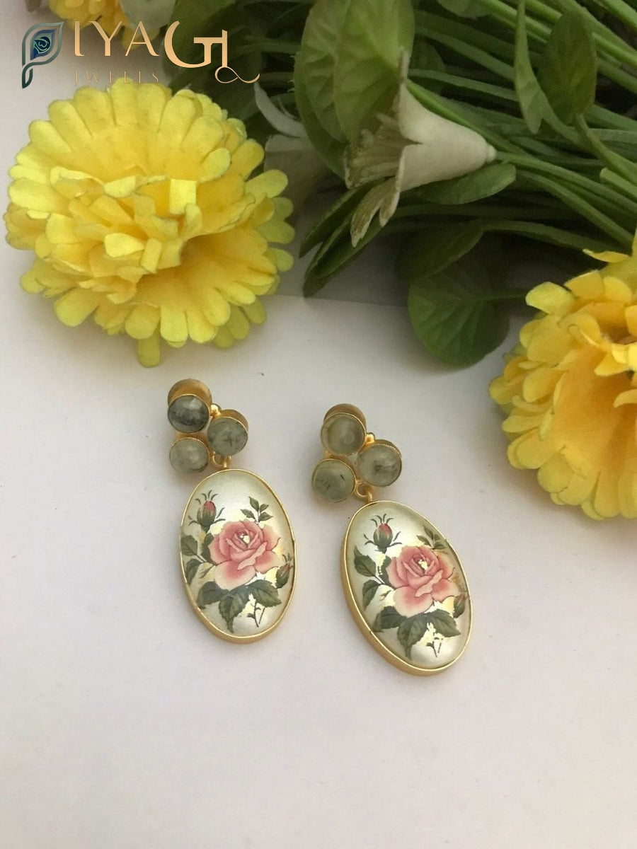 Handmade fusion earrings with green bead accents for festive wear - PiyaGuJwells
