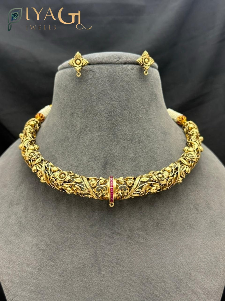 Stone stones on a gold-tone choker necklace set, ideal for festive occasions - PiyaGuJwells