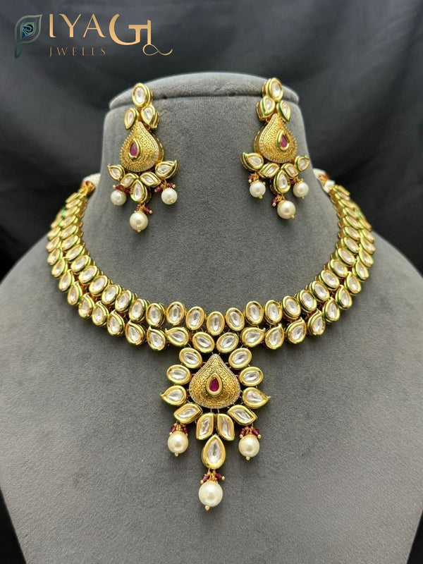 Gold tone multicolor Stone floral necklace earring set for festive occasions - PiyaGuJwells