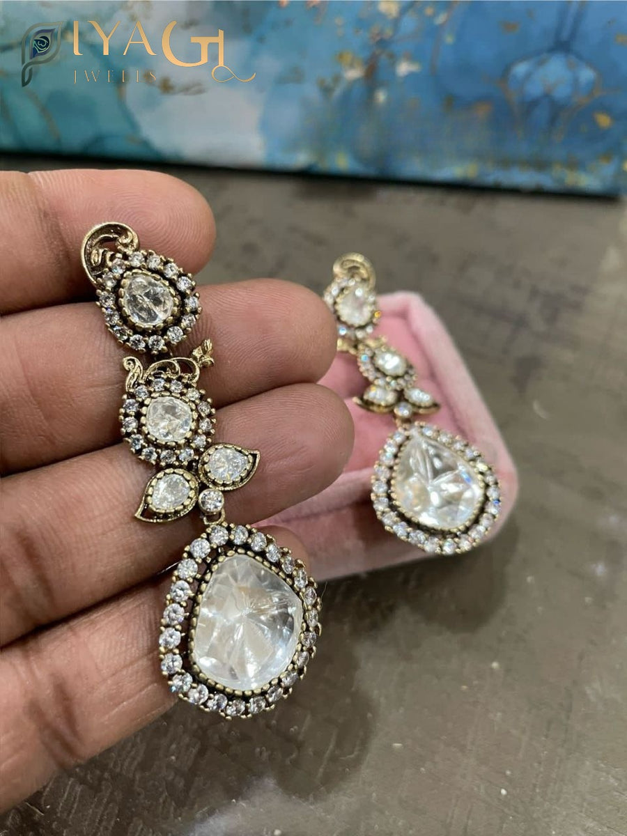 White stone gold tone floral design chandbali earrings for bridal wear - PiyaGuJwells
