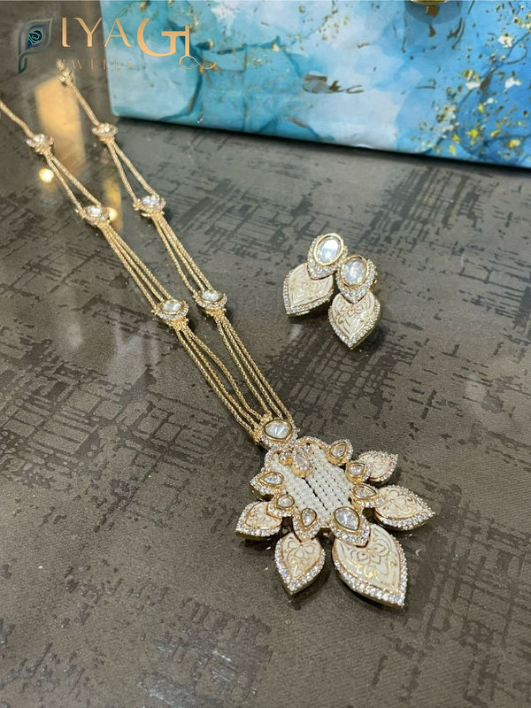 Gold tone floral design white stone necklace set for festive occasions - PiyaGuJwells