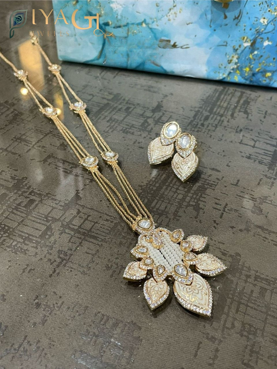 Gold tone floral design white stone necklace set for festive occasions - PiyaGuJwells