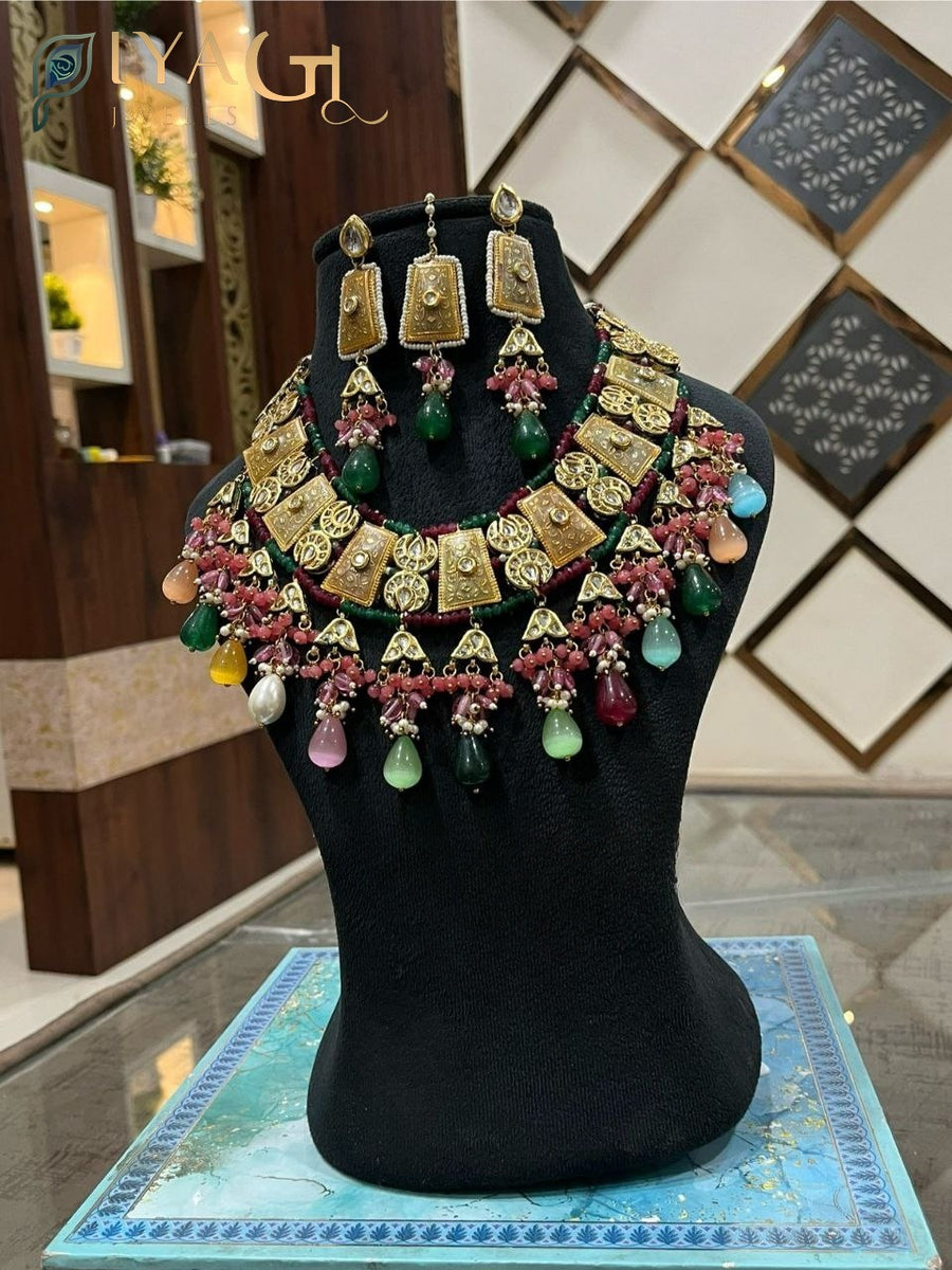 Multicolored stone stones on a gold-tone layered necklace set for festive occasions - PiyaGuJwells