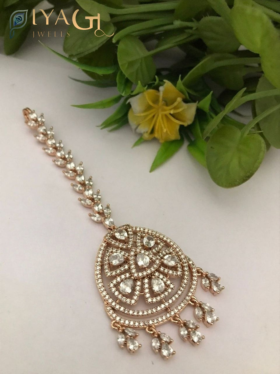 Rose gold floral design maang tikka with white cubic zirconia stones for ethnic wear - PiyaGuJwells