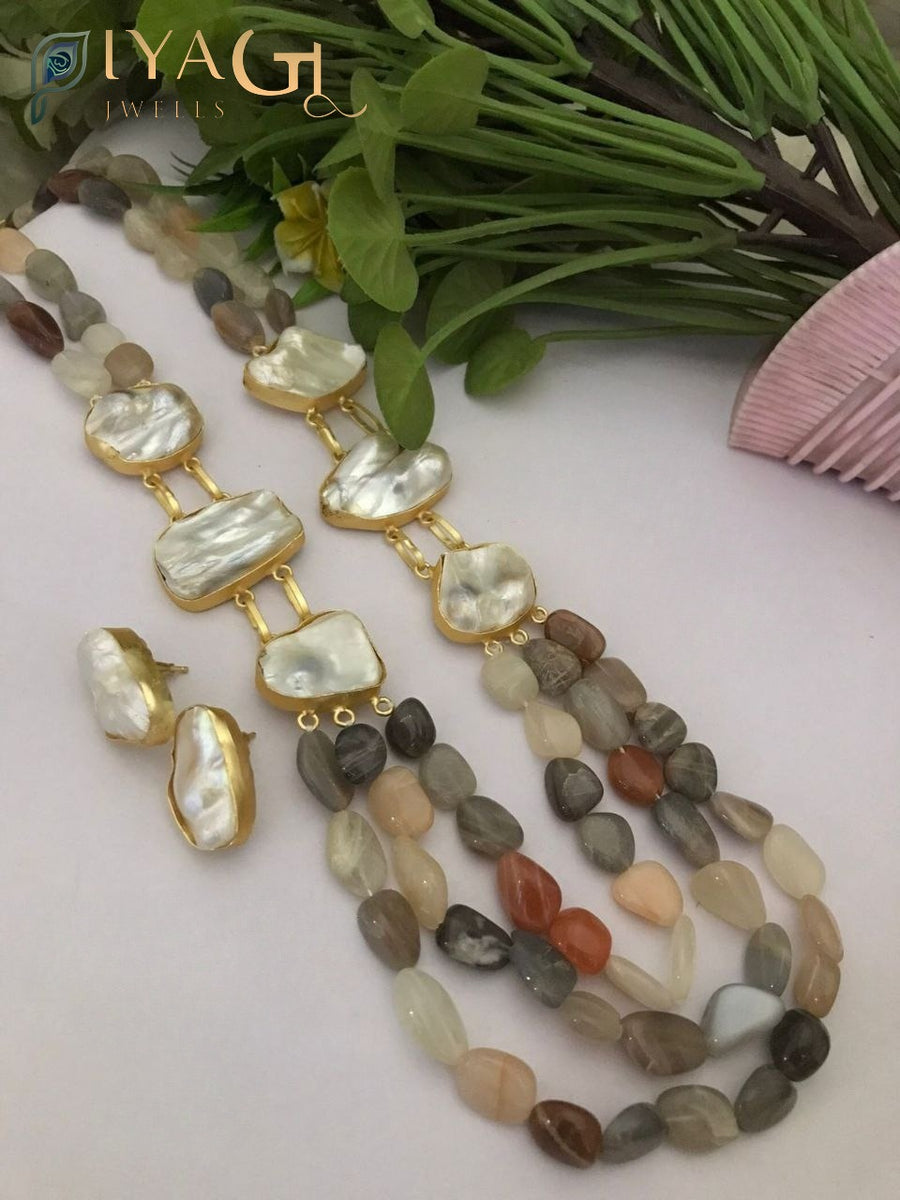 Gold tone white pearl layered necklace and earring set for festive wear - PiyaGuJwells