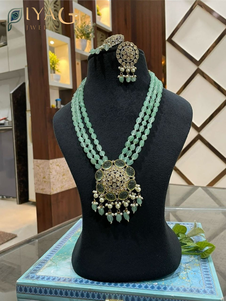 Gold platted green stone floral necklace earring set for ethnic wear - PiyaGuJwells