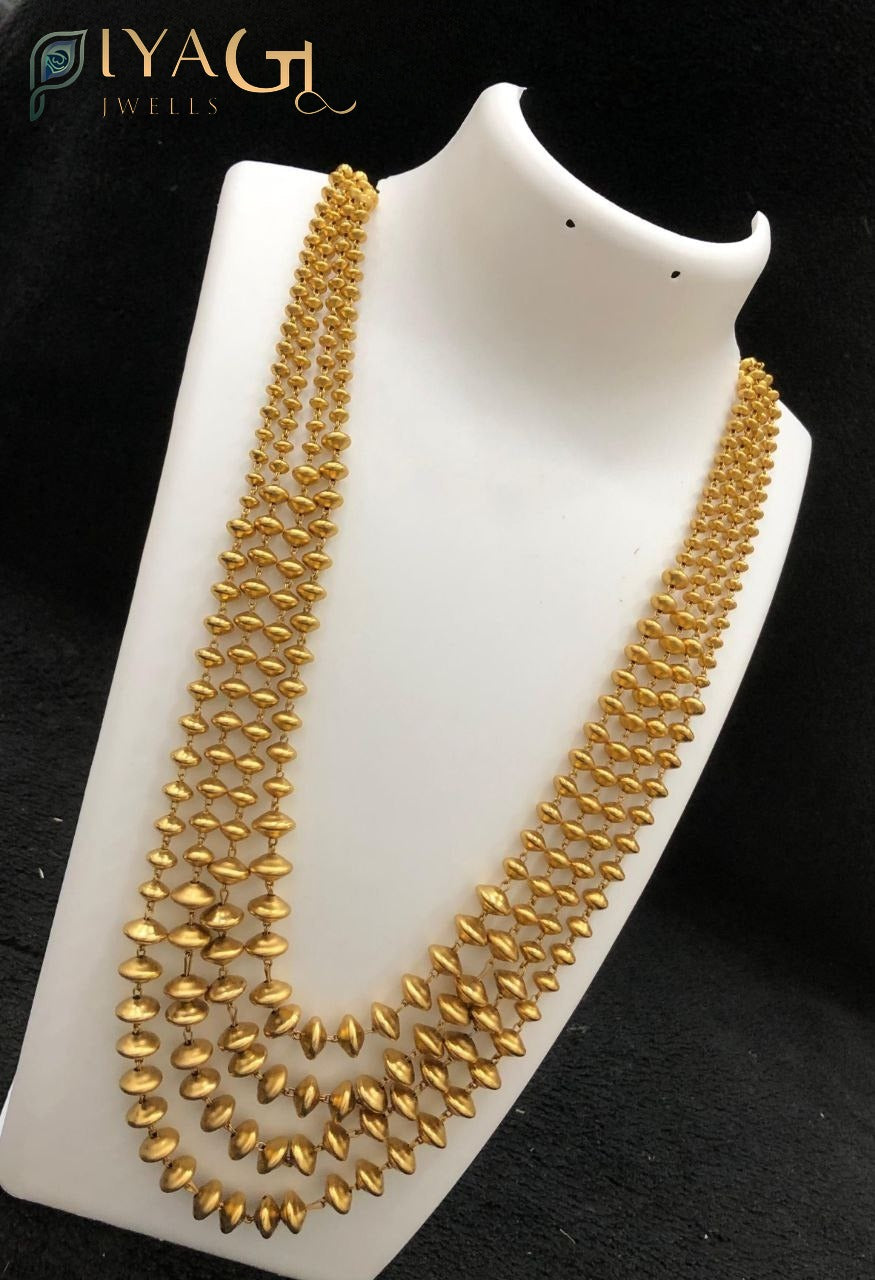Gold finish geometric necklace and earring set for ethnic wear - PiyaGuJwells