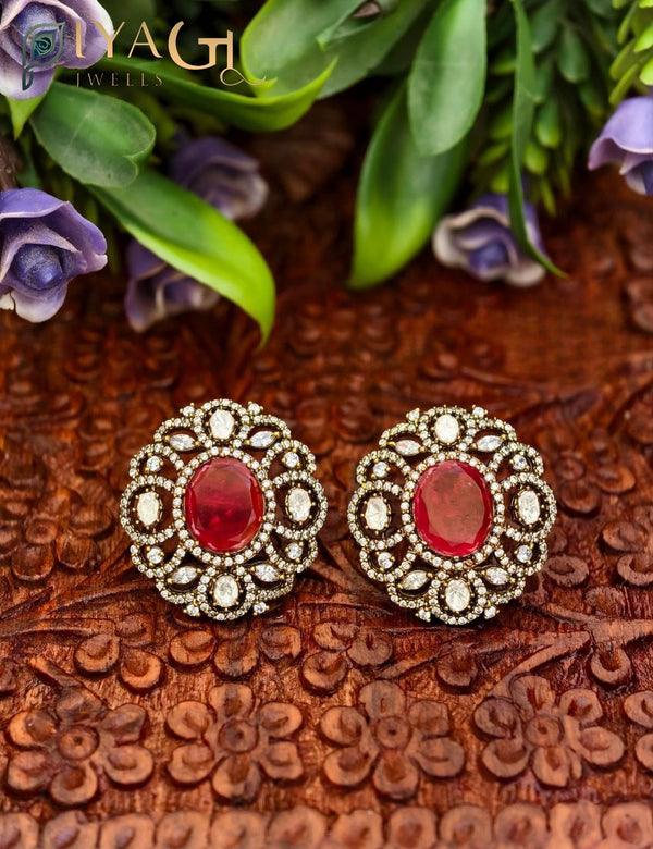 Silver tone with red stone stones in an antique finish floral design for ethnic wear. - PiyaGuJwells