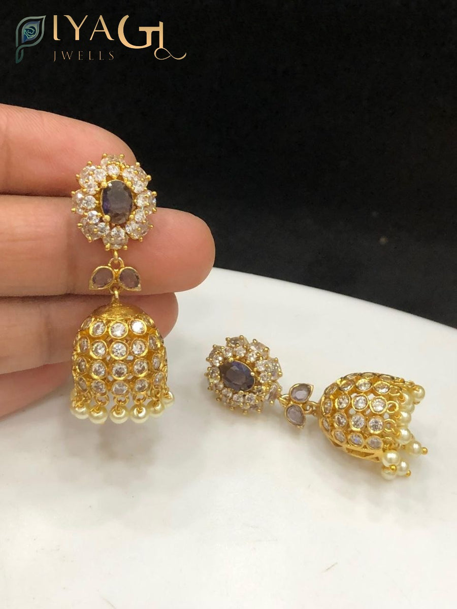 Gold tone red stone floral design antique finish jhumka earrings for ethnic wear - PiyaGuJwells