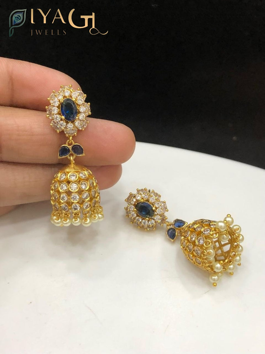 Gold tone red stone floral design antique finish jhumka earrings for ethnic wear - PiyaGuJwells