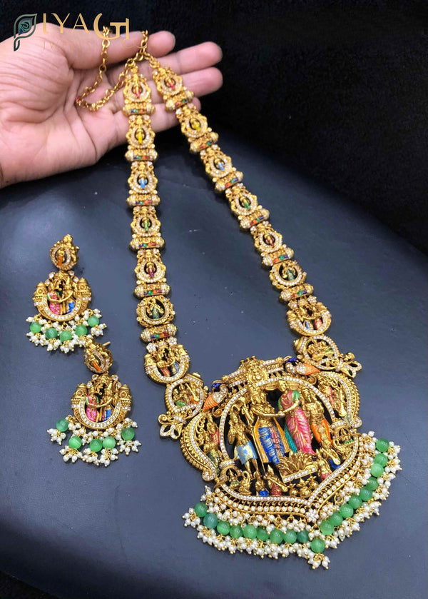 Gold antique finish layered necklace set featuring temple motifs for festive occasions - PiyaGuJwells