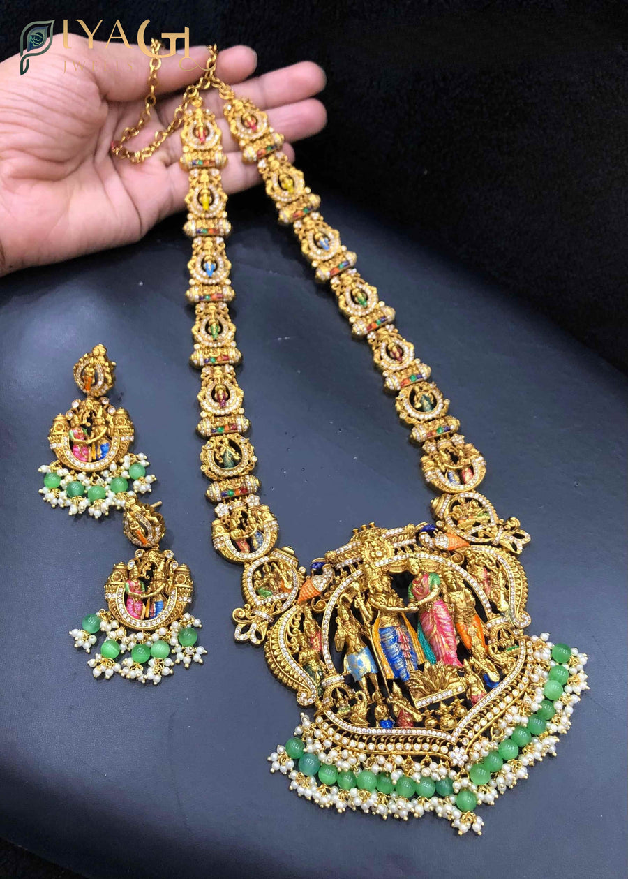 Gold antique finish layered necklace set featuring temple motifs for festive occasions - PiyaGuJwells