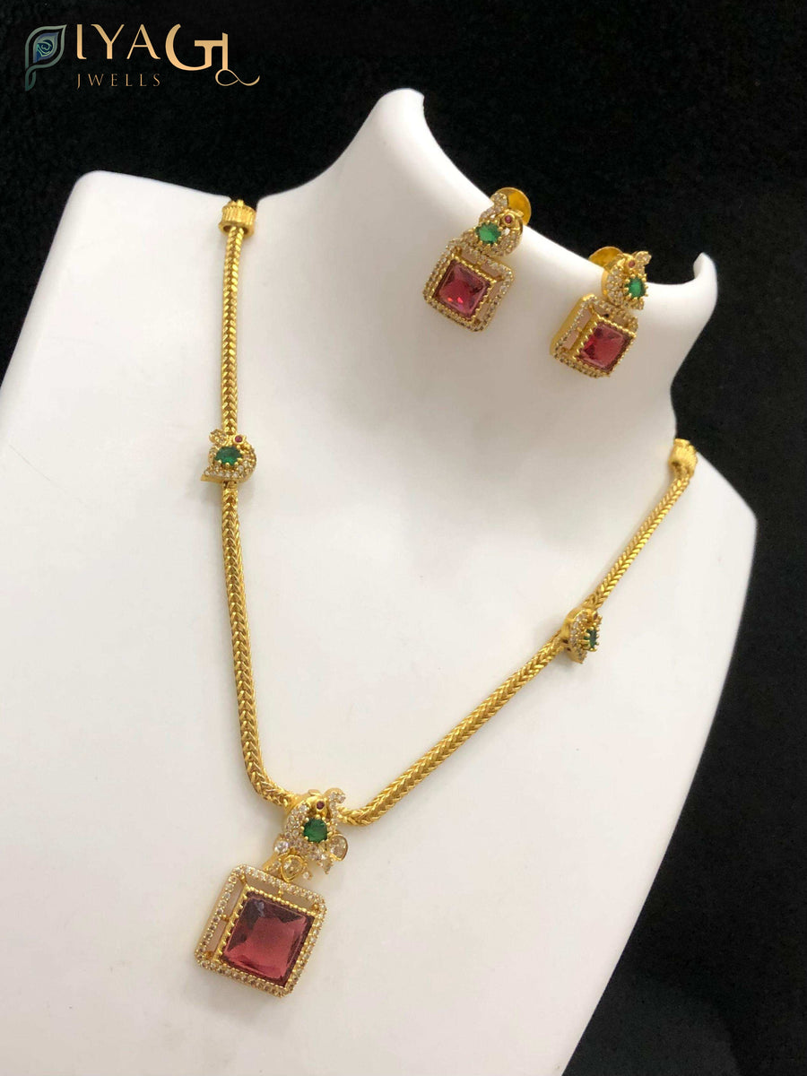 Gold antique polish multicolored cubic zirconia layered necklace set for festive occasions - PiyaGuJwells