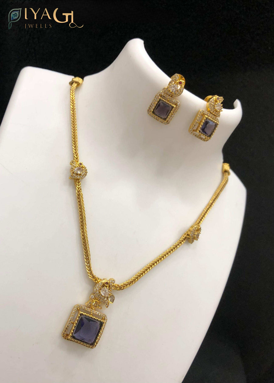 Gold antique polish multicolored cubic zirconia layered necklace set for festive occasions - PiyaGuJwells