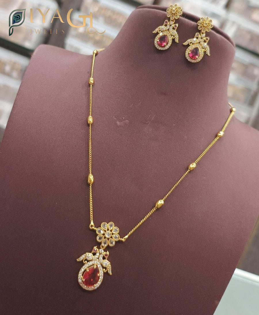 Gold tone red kundan floral layered necklace earring set for festive occasions - PiyaGuJwells