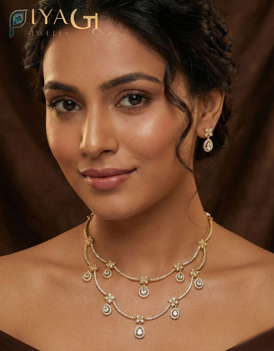 Antique finish layered necklace set with floral motifs and colored stone pendants displayed on a mannequin and model wearing the jewelry. - PiyaGuJwells