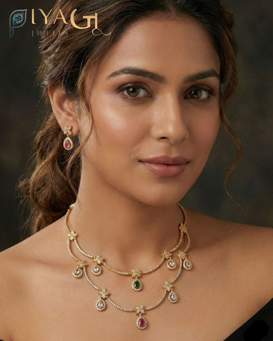 Antique finish layered necklace set with floral motifs and colored stone pendants displayed on a mannequin and model wearing the jewelry. - PiyaGuJwells