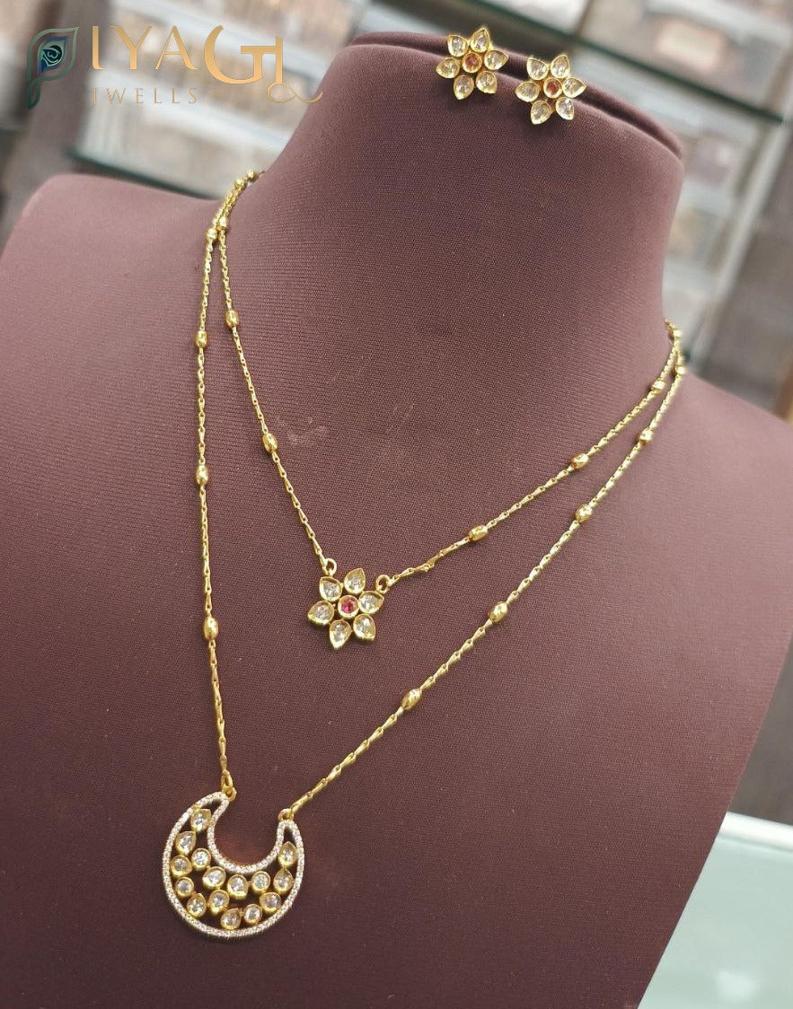 Gold tone floral design with kundan stones, ideal for festive wear - PiyaGuJwells