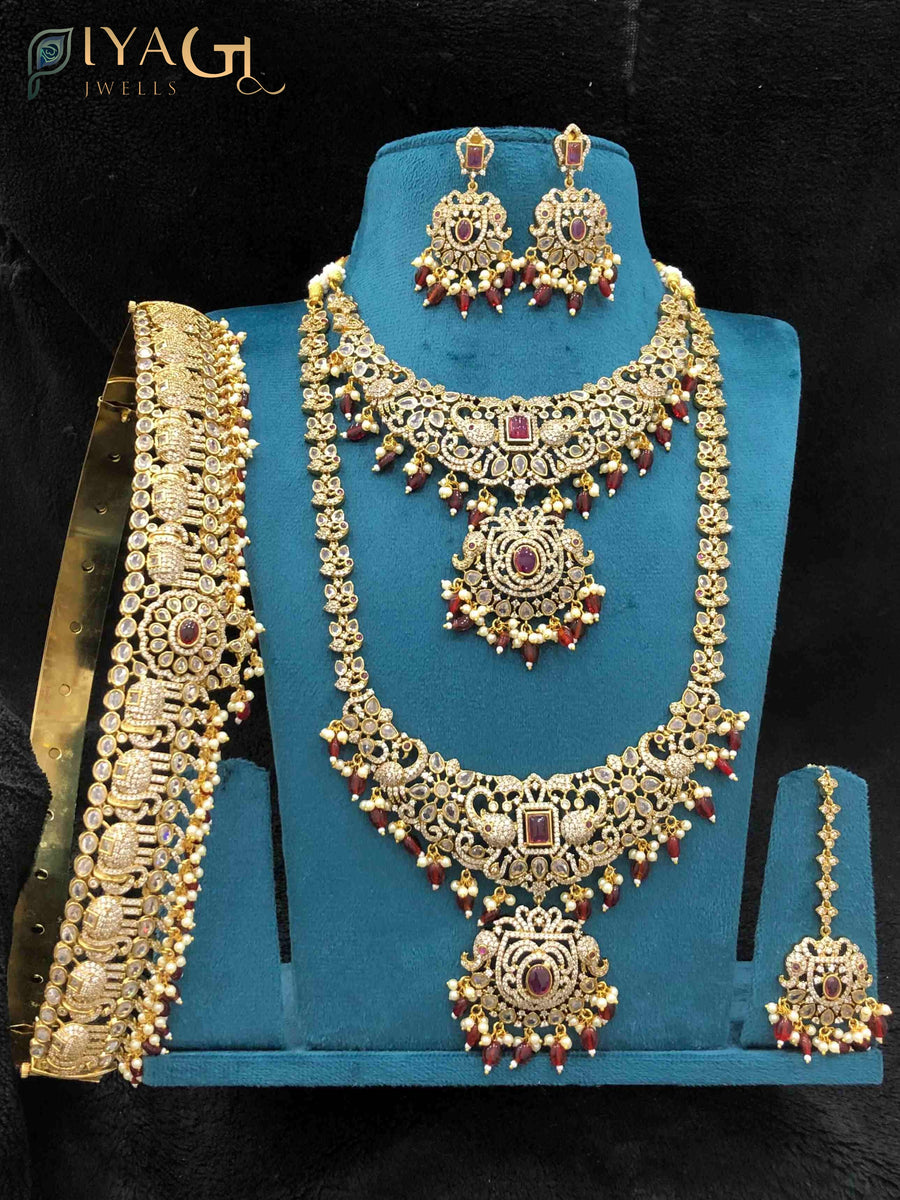 Gold polished layered artificial jewellery set with cubic zirconia stones for bridal wear - PiyaGuJwells