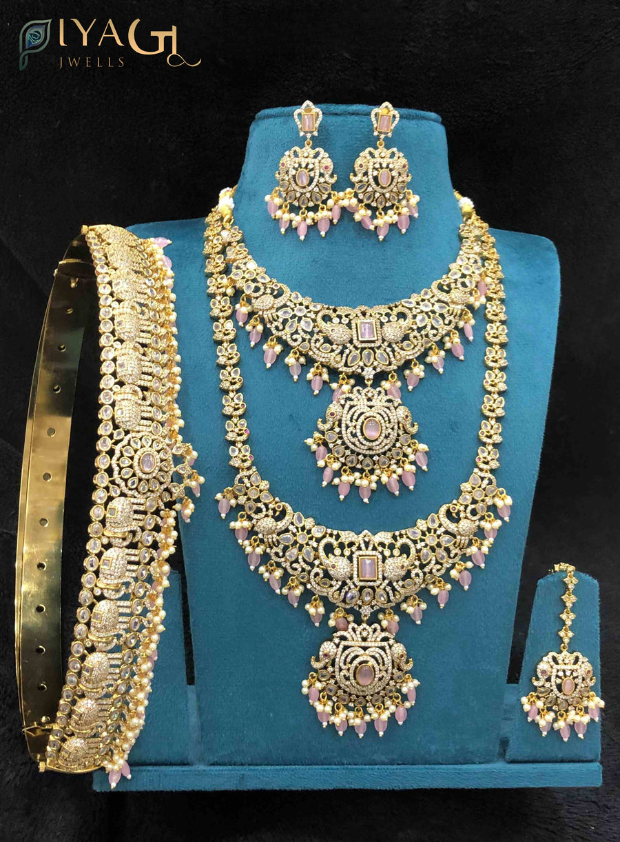 Gold polished layered artificial jewellery set with cubic zirconia stones for bridal wear - PiyaGuJwells