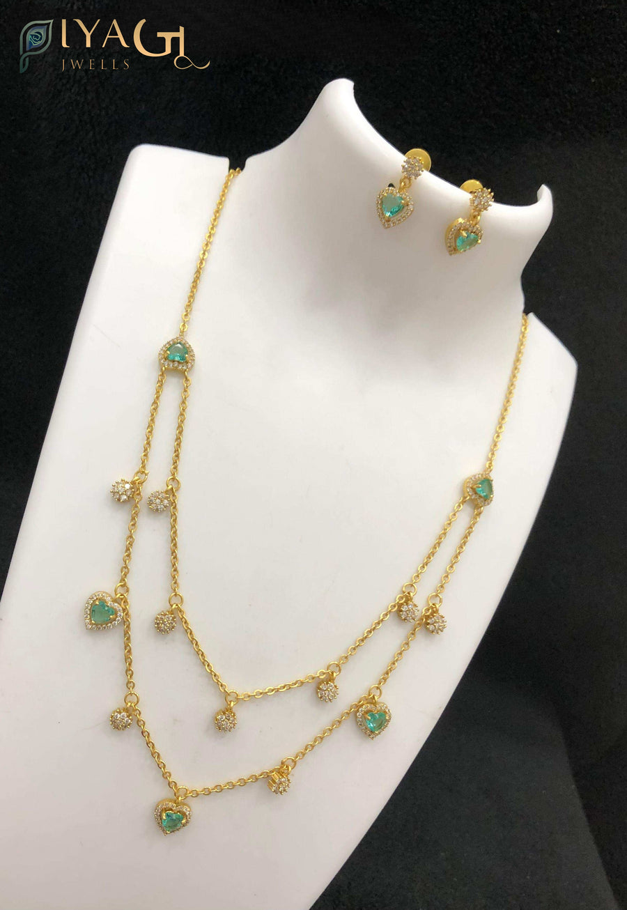 Gold antique polish multicolor cubic zirconia layered necklace set for festive wear - PiyaGuJwells
