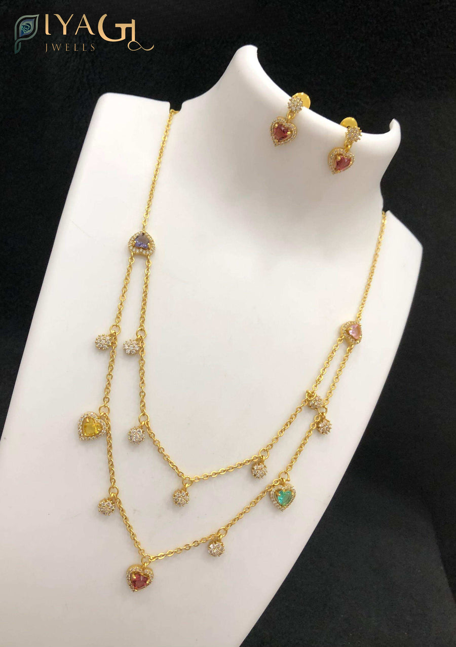 Gold antique polish multicolor cubic zirconia layered necklace set for festive wear - PiyaGuJwells